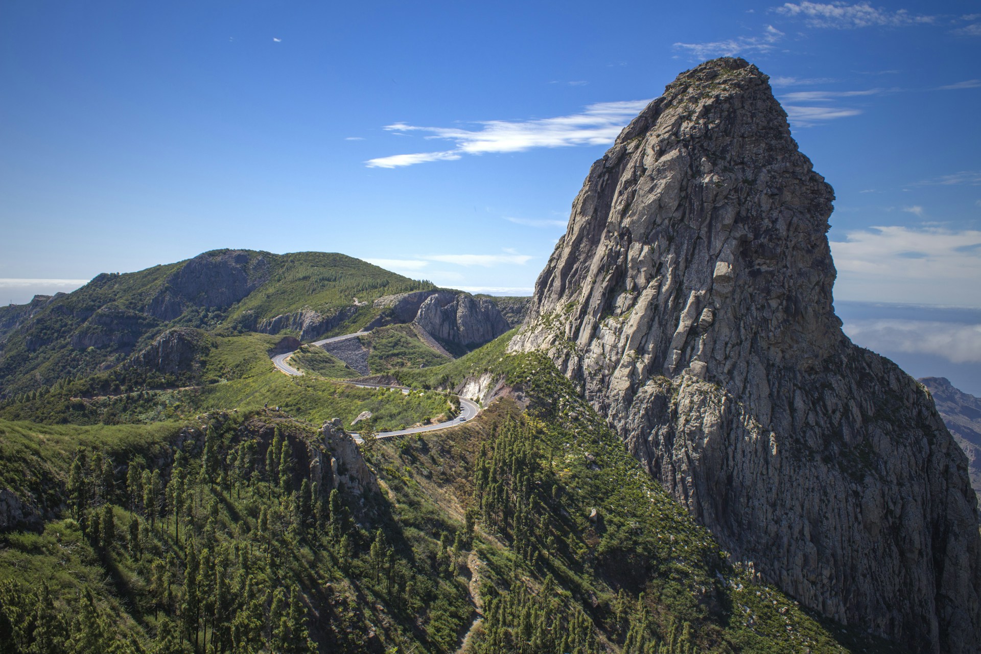 a mountain with a road going through it