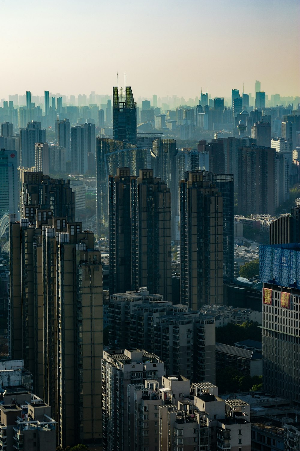 a view of a city with tall buildings