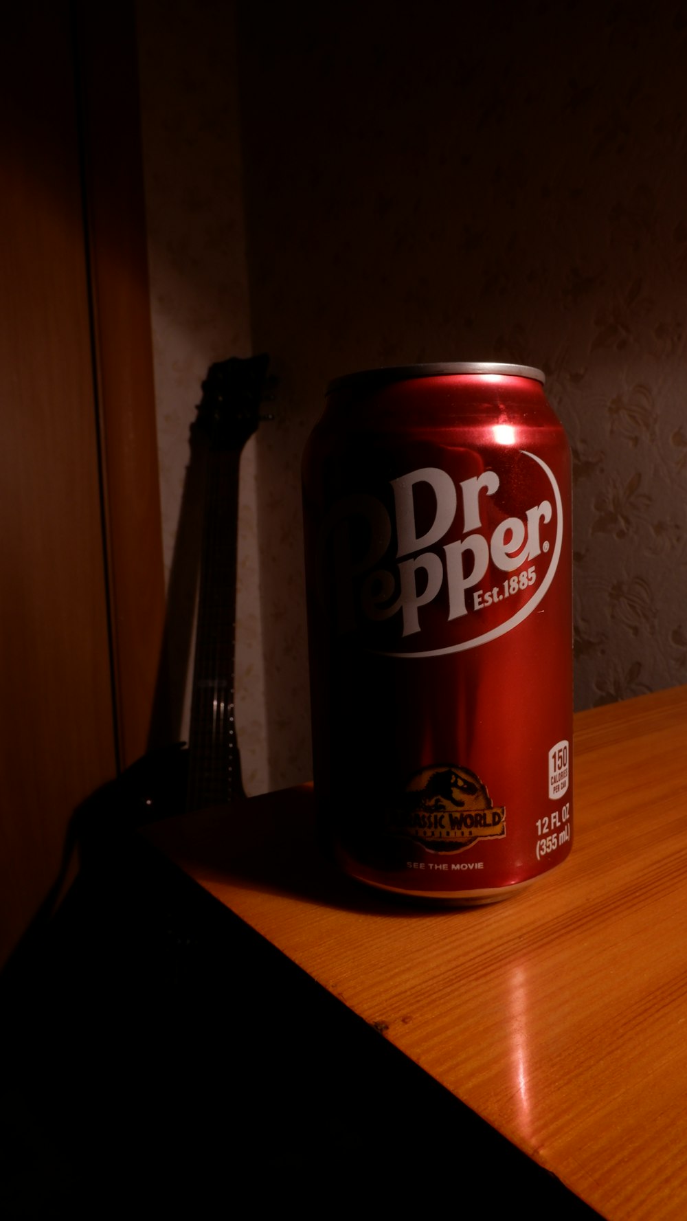 a can of dr pepper sitting on a table