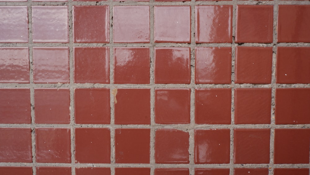 a close up of a red brick wall