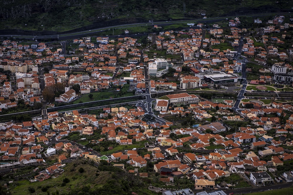 an aerial view of a city with lots of buildings