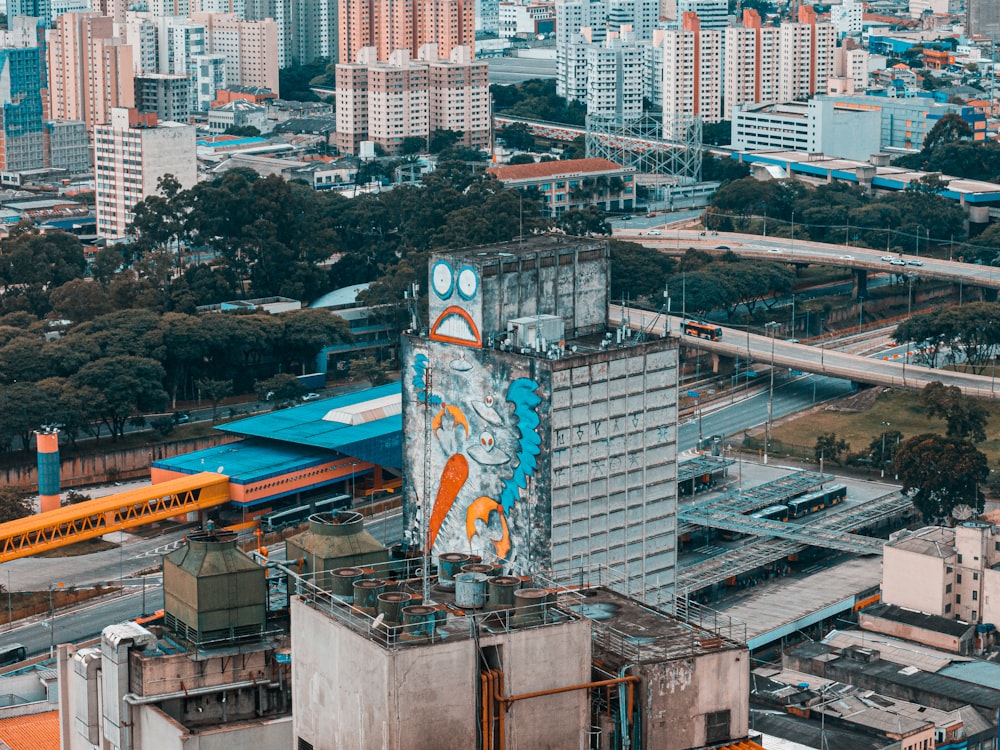 an aerial view of a city with tall buildings