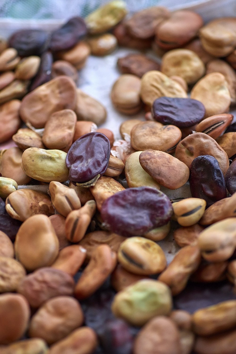 a pile of nuts sitting on top of a table