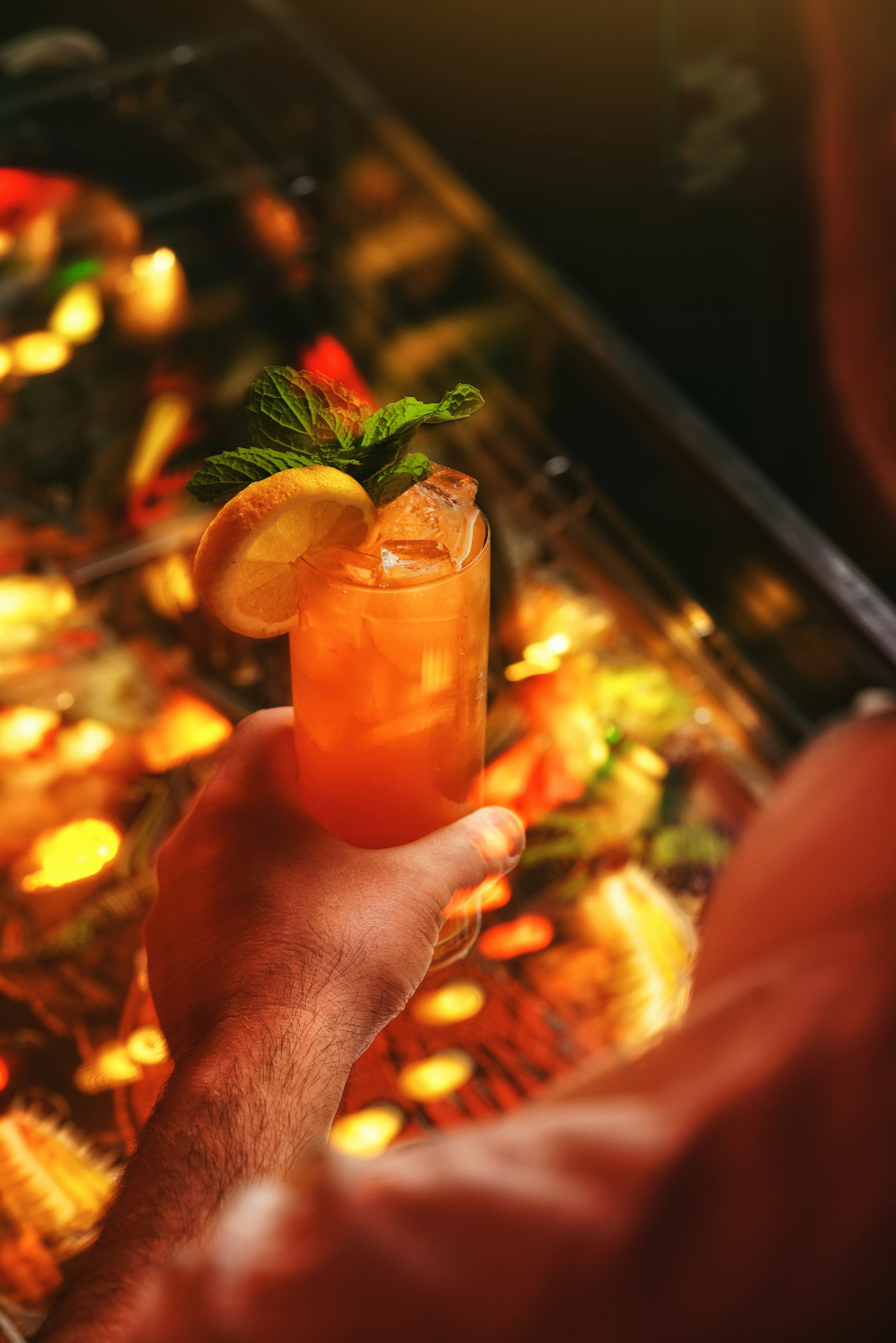 A tropical rum punch with festive garnishes