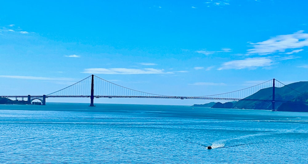 a large bridge spanning over a large body of water