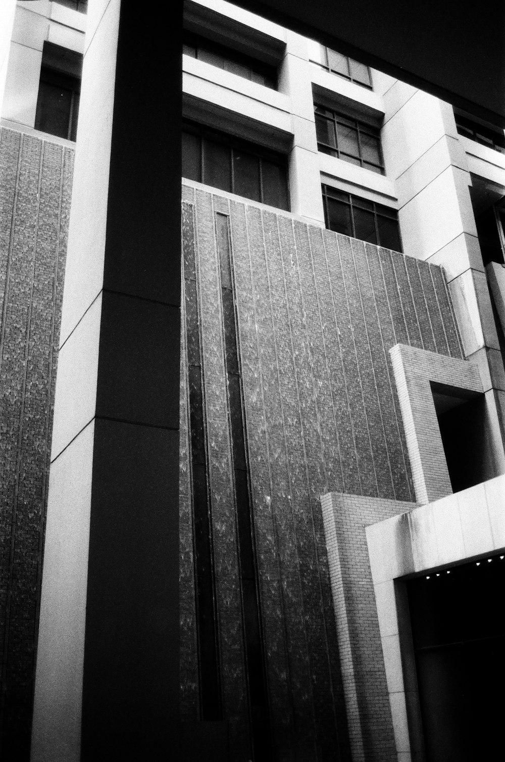 a black and white photo of a tall building