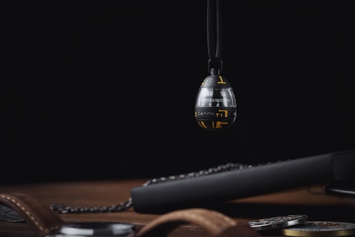 A sleek, futuristic quantum device glowing softly in a dimly lit lab, hinting at the mysteries of time travel.