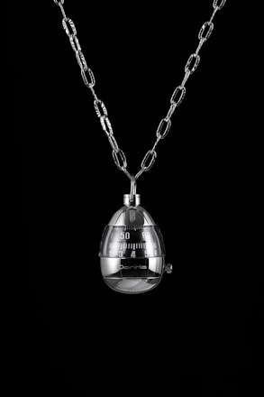 A sleek digital Pomodoro timer glowing softly against a dark background.