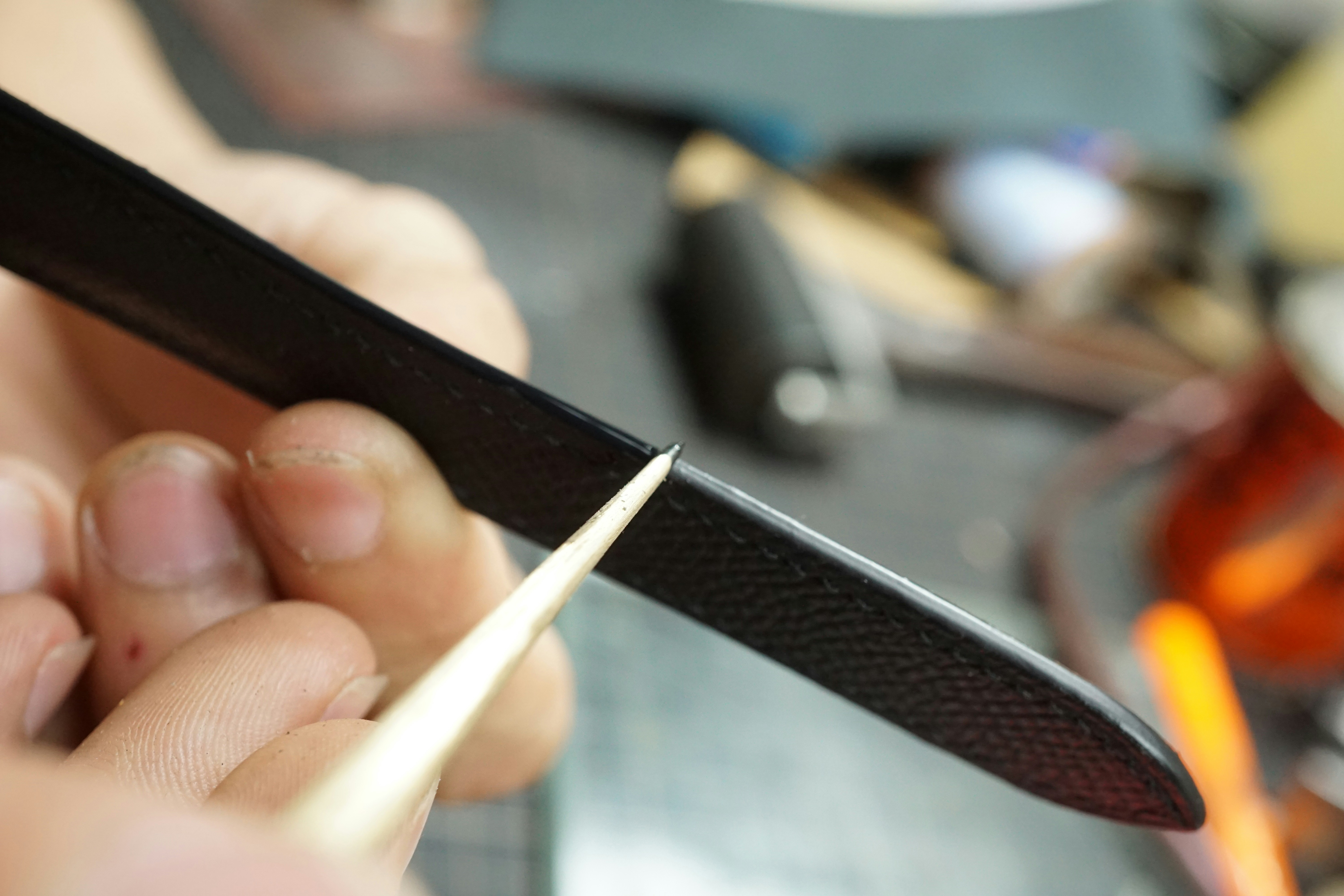 technician using a fin comb to straighten fins - Condenser coil cleaning