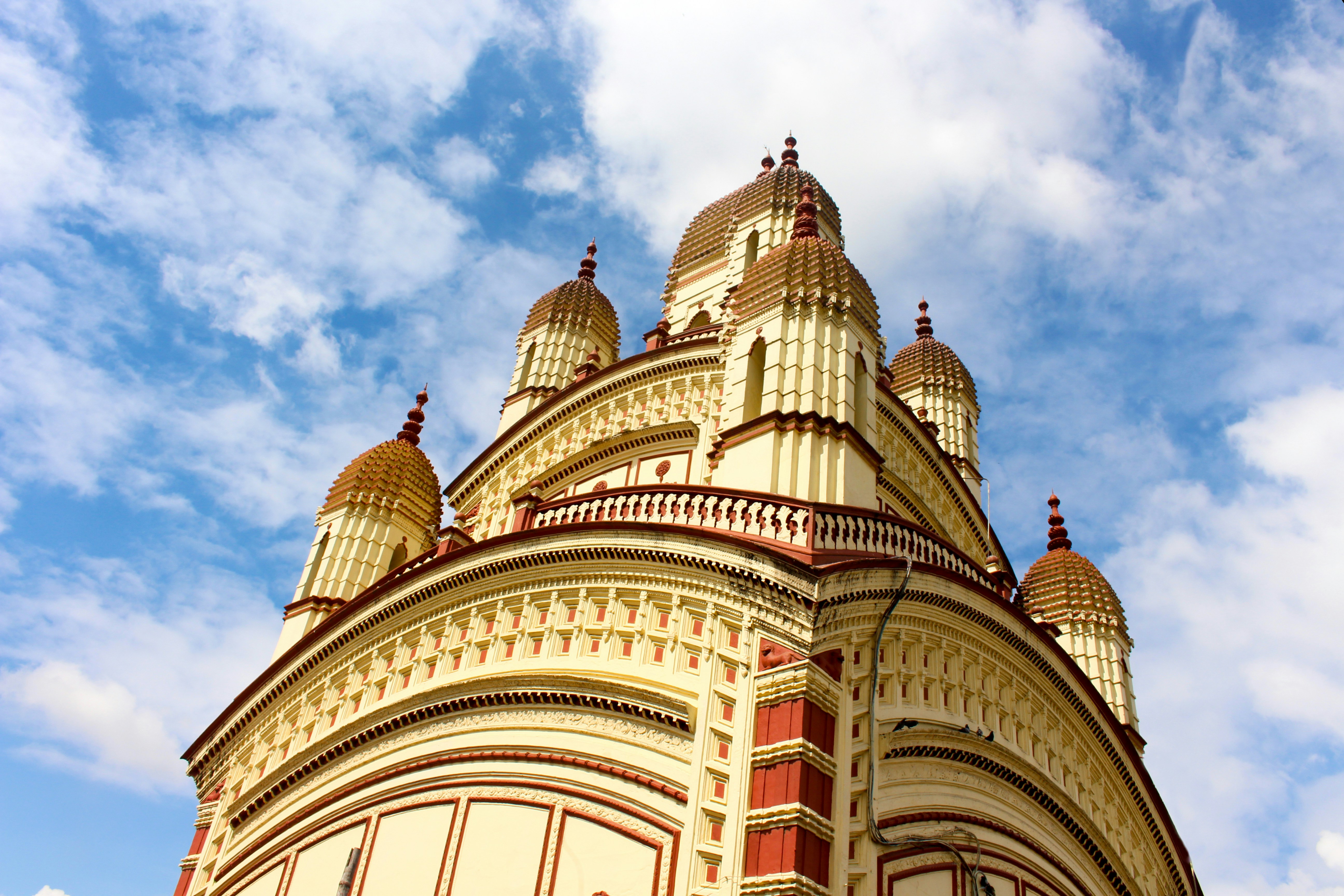 a very tall building with a clock on it's side