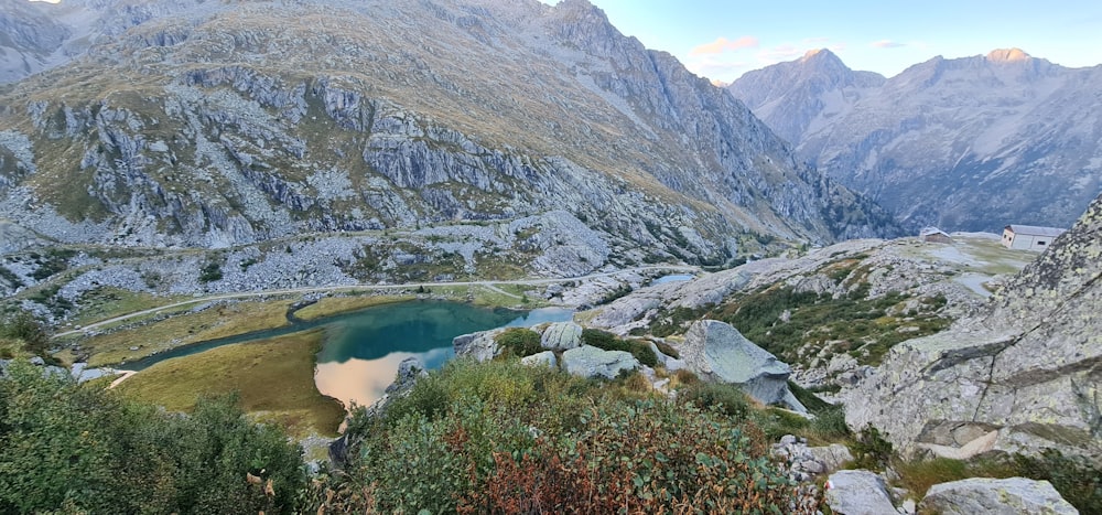 a view of a mountain range with a lake in the middle