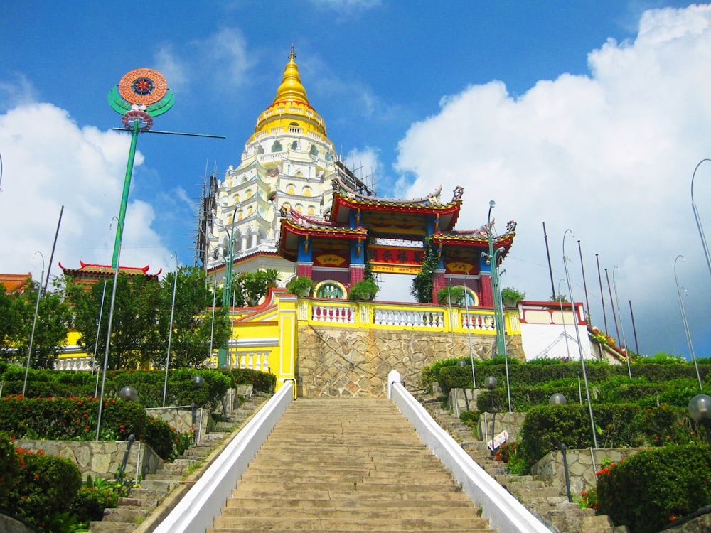 a staircase leading up to a large building