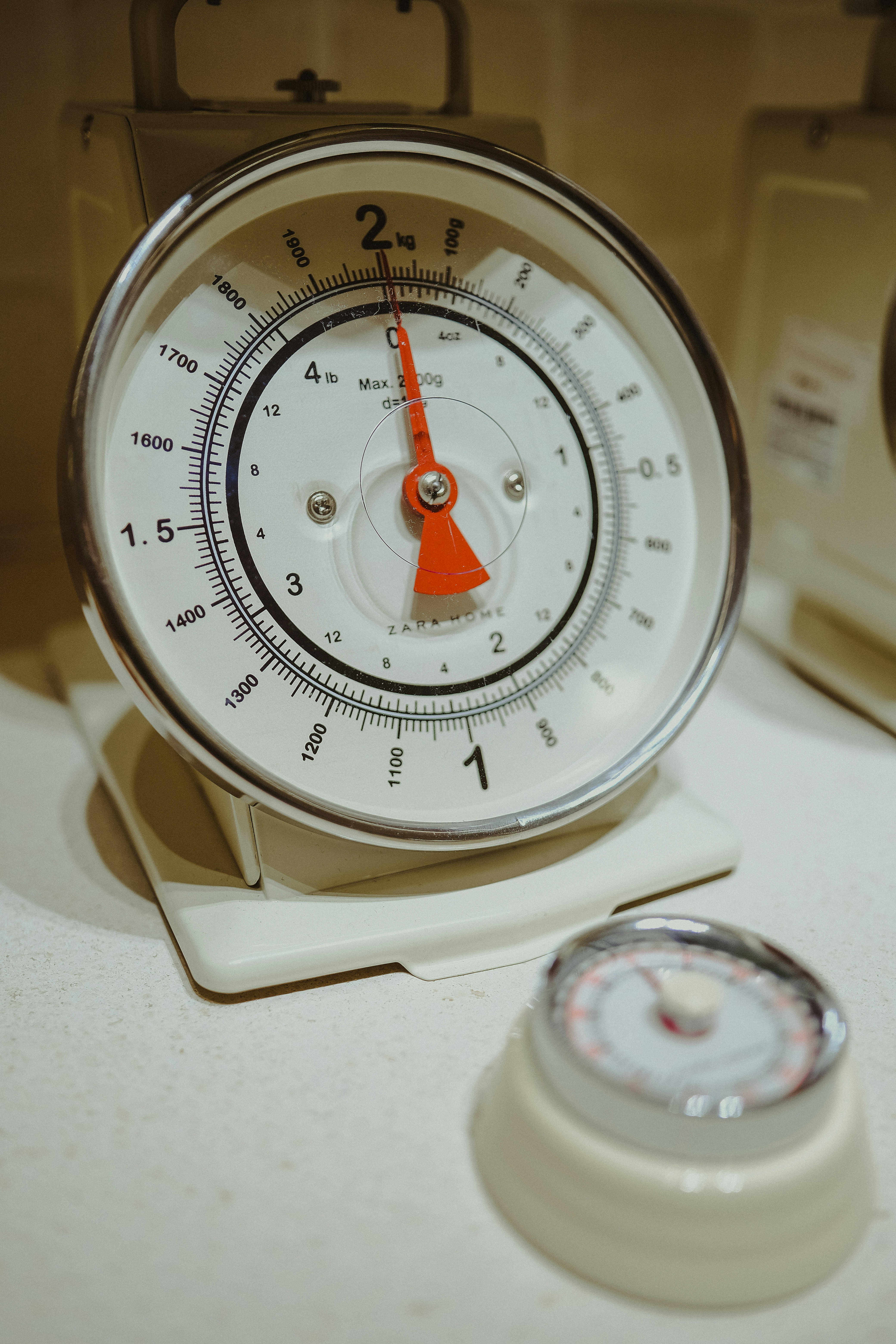 a close up of a clock on a table