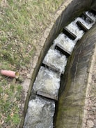 A channel being dredged for improved water flow.