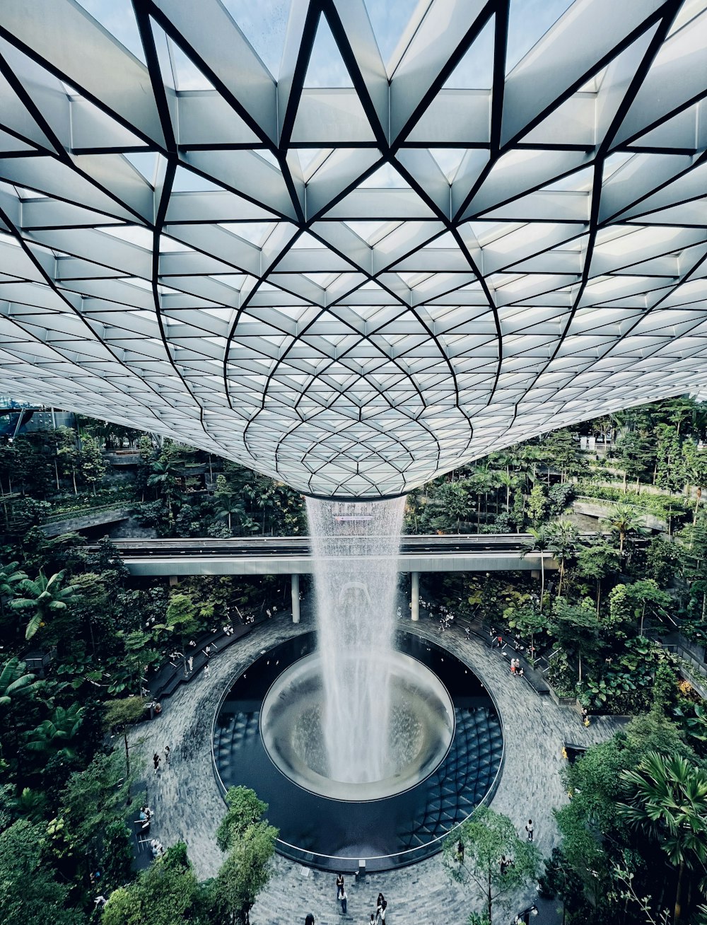 a fountain in the middle of a park