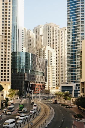 a city street filled with lots of tall buildings