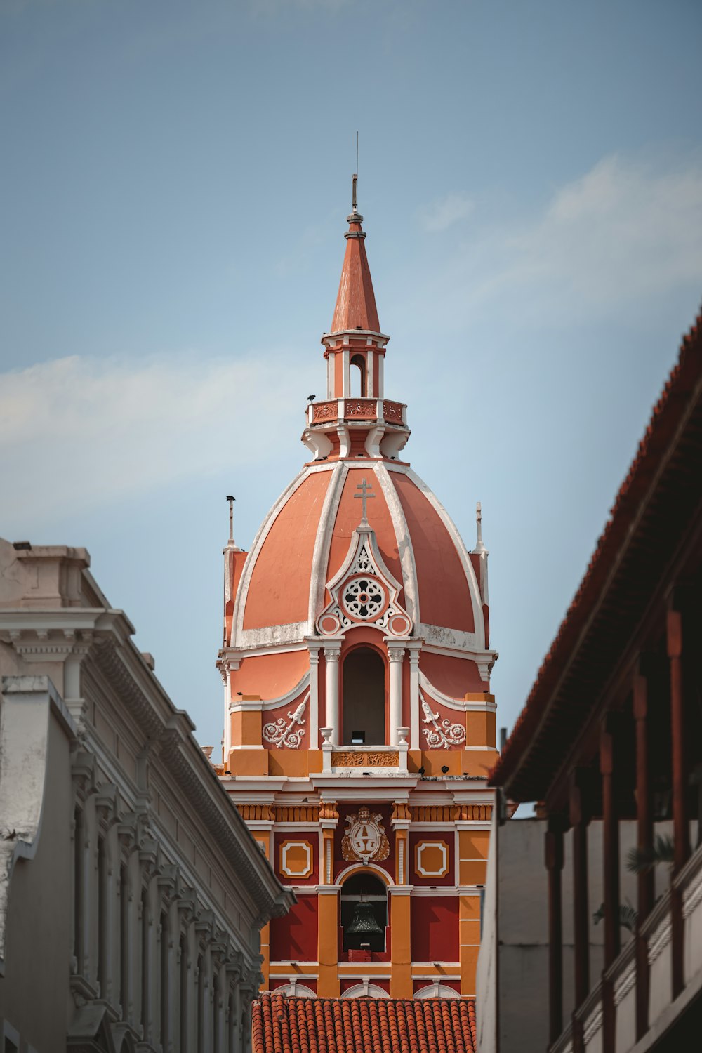 a tall building with a clock on the top of it