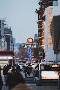 A vibrant cityscape of Beijing with diverse people walking and engaging in daily life.