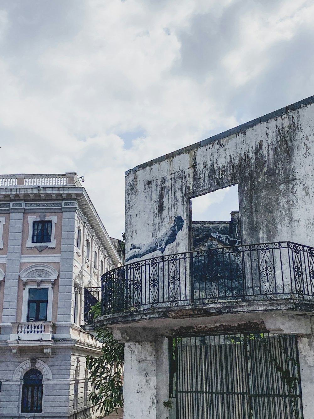 an old building with a balcony and balcony railing