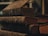 A stack of old, worn books with dark, textured covers and faded red page edges, conveying a sense of antiquity and history.