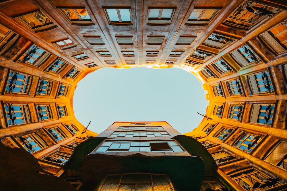 looking up at a tall building from the ground