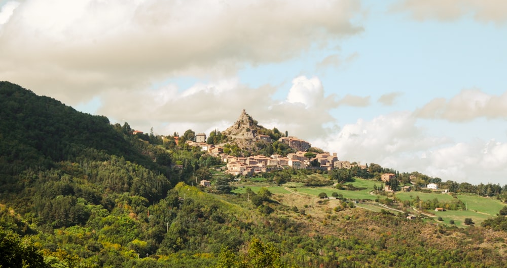 a hill with a village on top of it