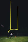 A referee showing a yellow card to a player.