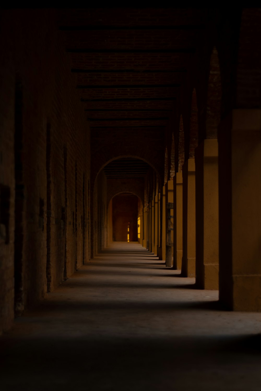 a long hallway with a clock on the wall