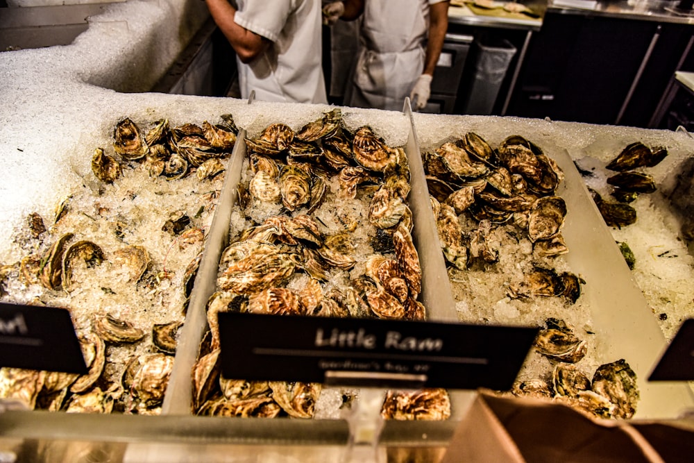 a bunch of different types of food on display