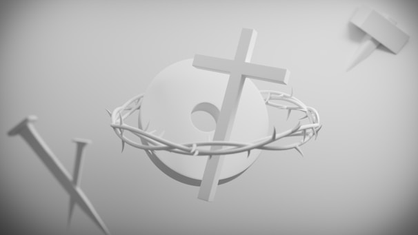 A minimalistic, monochromatic design featuring a cross, crown of thorns, and large nail. The elements are arranged on a plain background, with the cross intersecting a circular object entwined with the crown of thorns.
