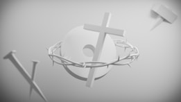 A minimalistic, monochromatic design featuring a cross, crown of thorns, and large nail. The elements are arranged on a plain background, with the cross intersecting a circular object entwined with the crown of thorns.
