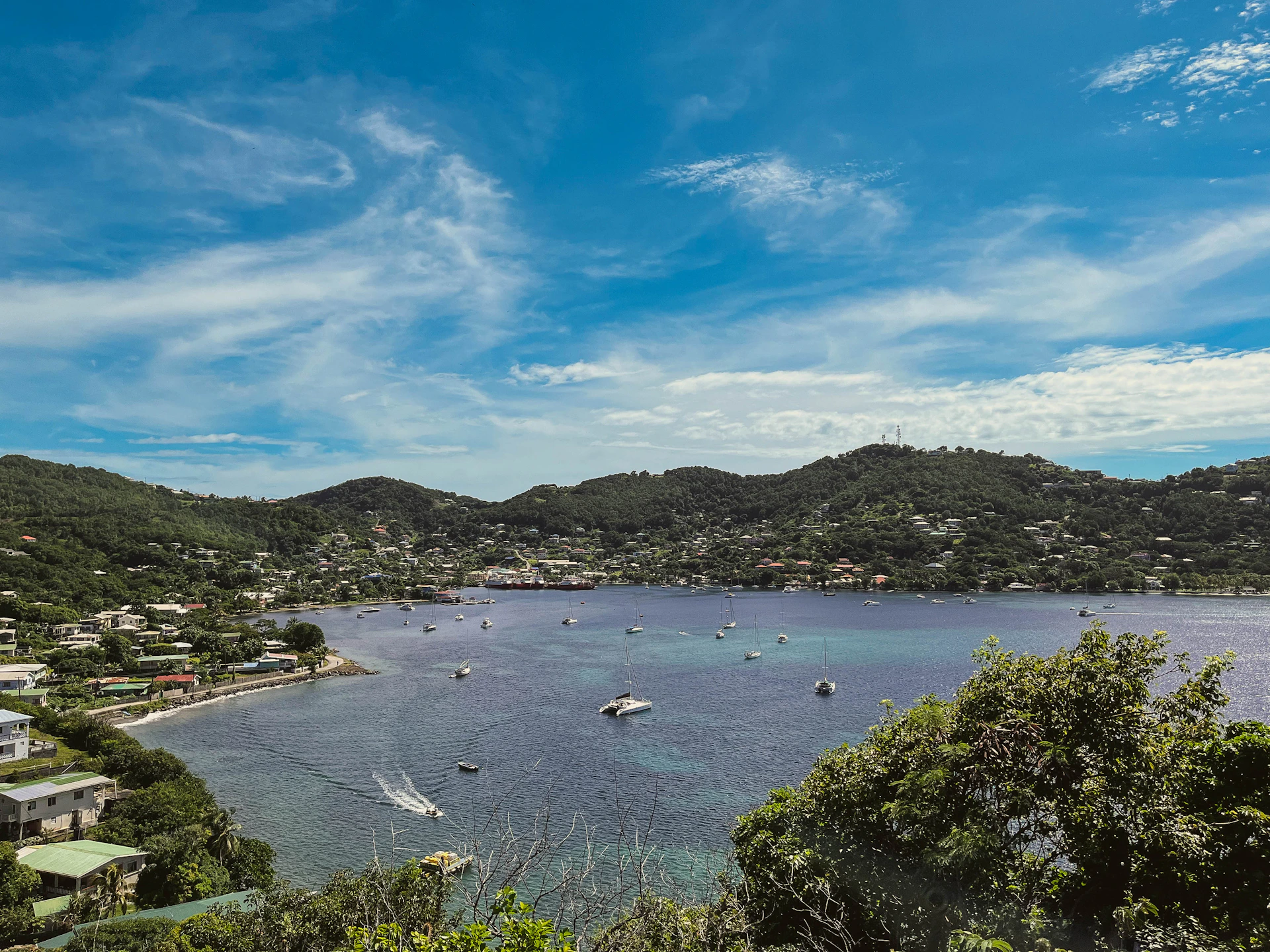 a view of a bay with boats in the water