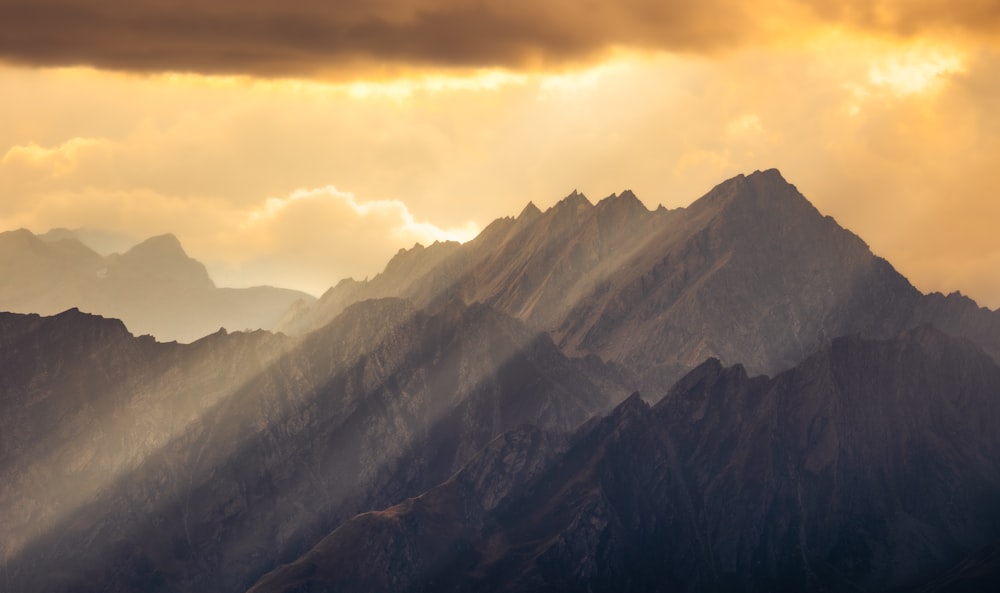 a view of a mountain range at sunset