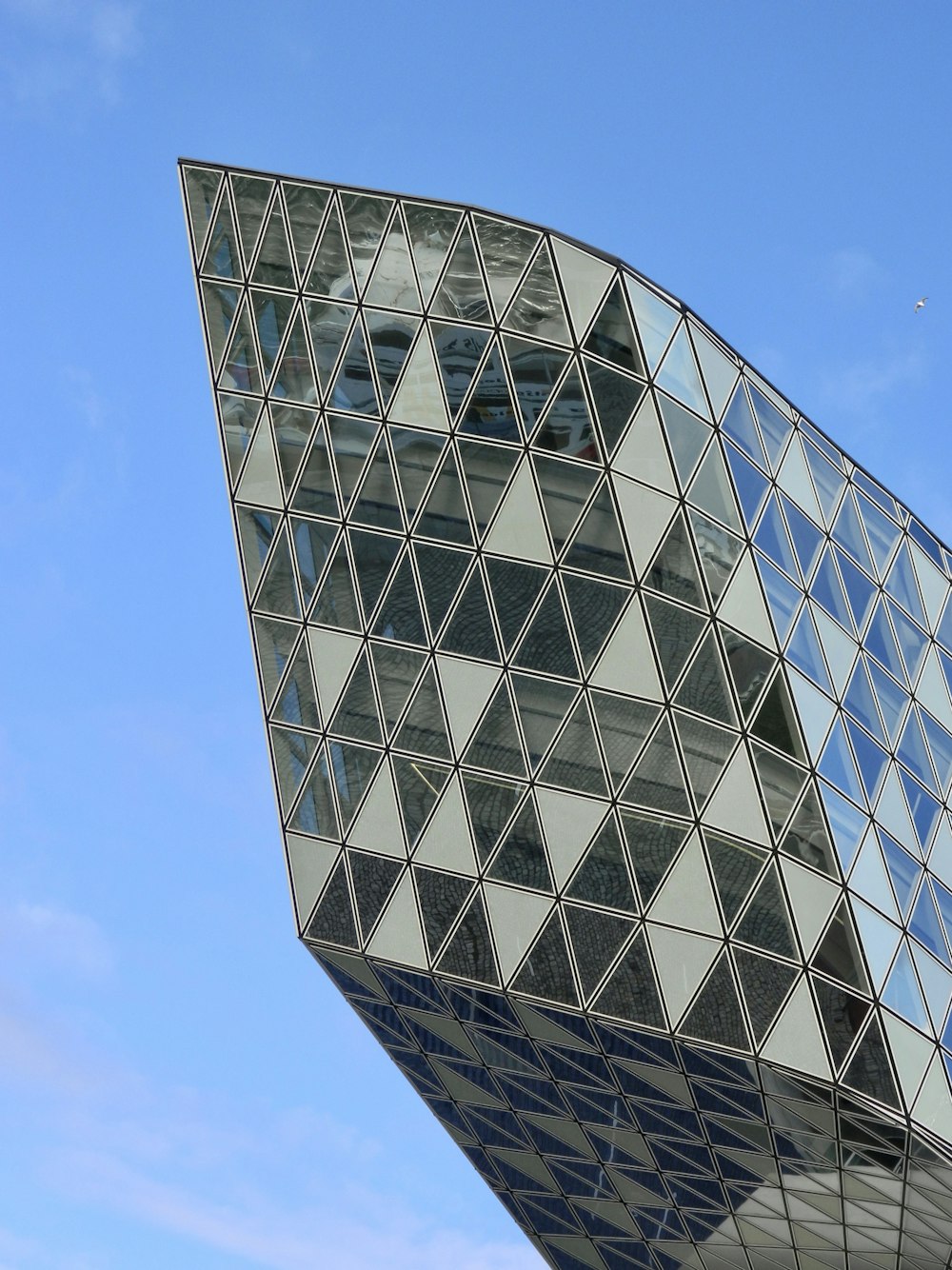 a very tall building with a clock on it's side