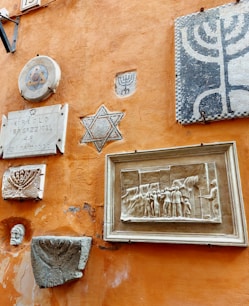 a wall that has some pictures on it