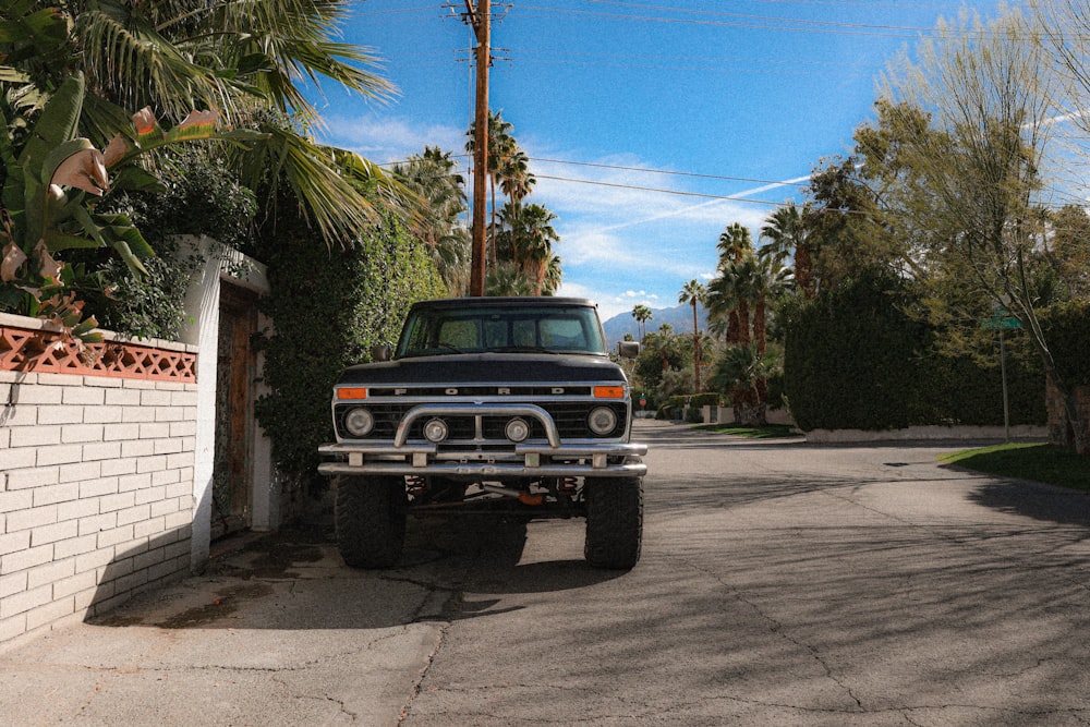 a truck parked on the side of a road