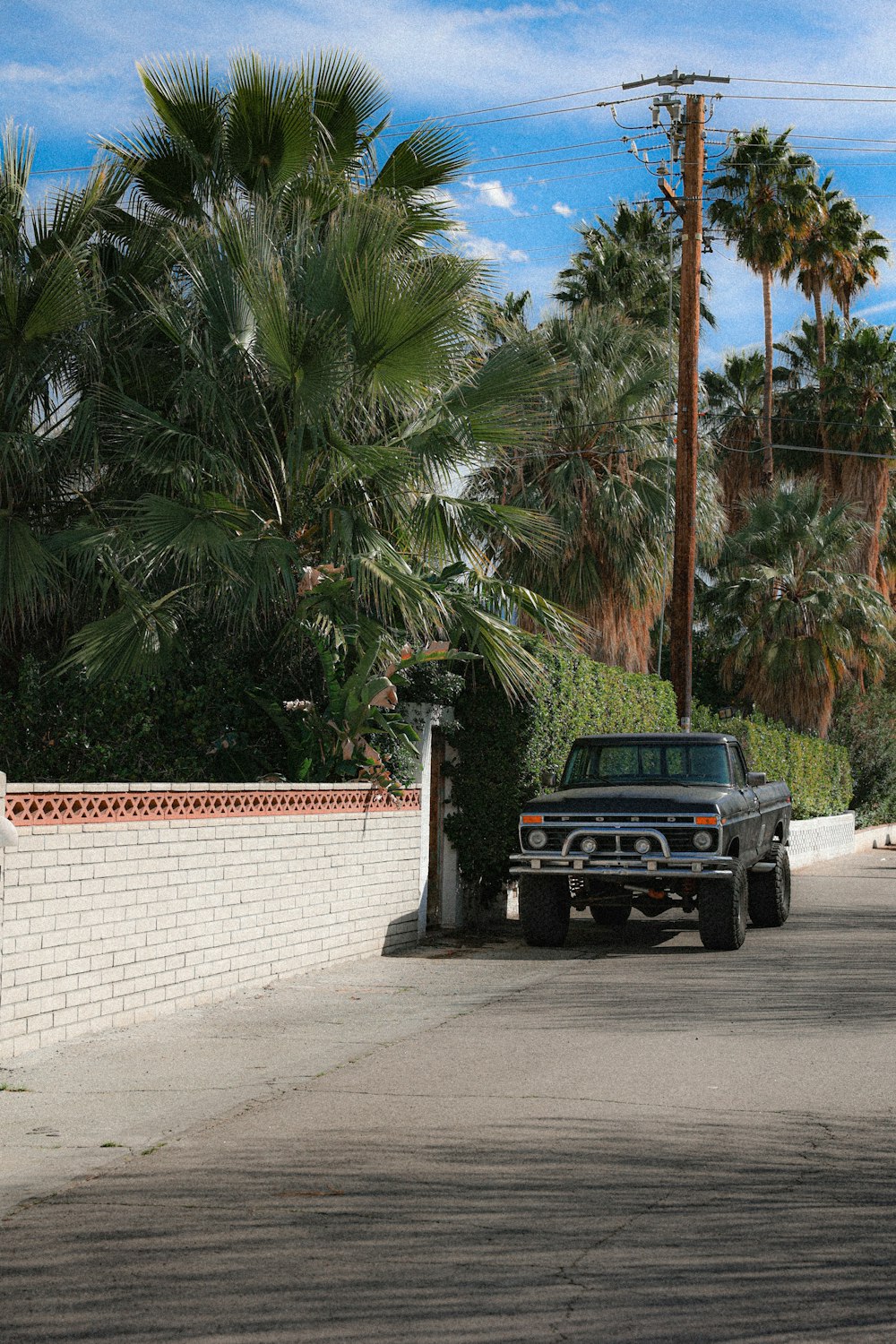 a truck parked on the side of a road