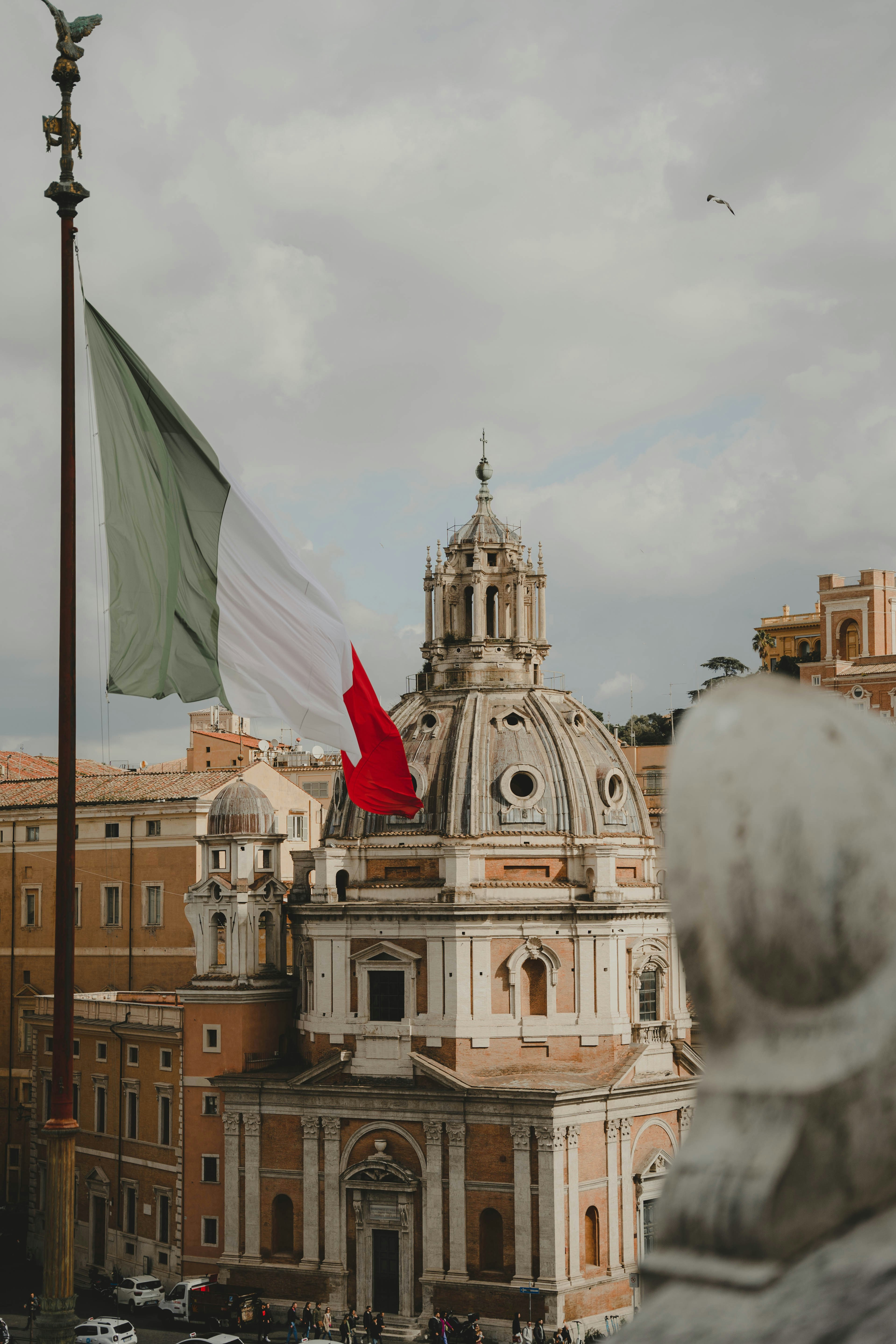 a large building with a flag on top of it
