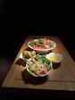 a couple of plates of food on a table