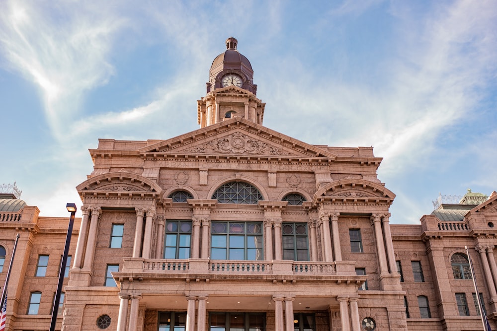 a large building with a clock on the top of it