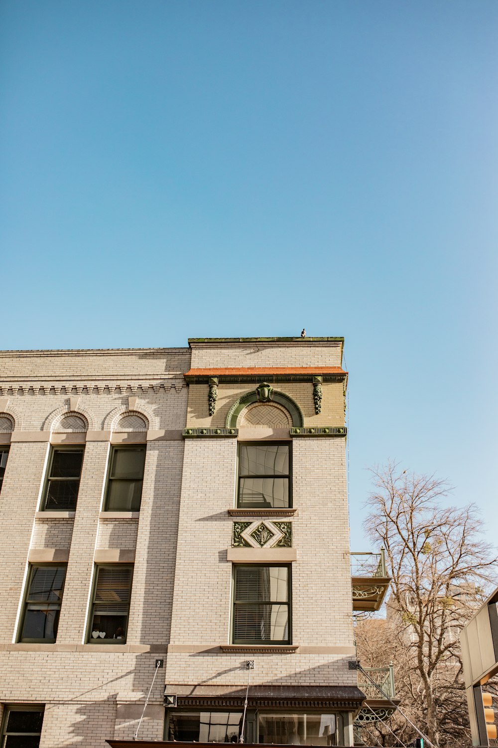 a tall building with a clock on the front of it