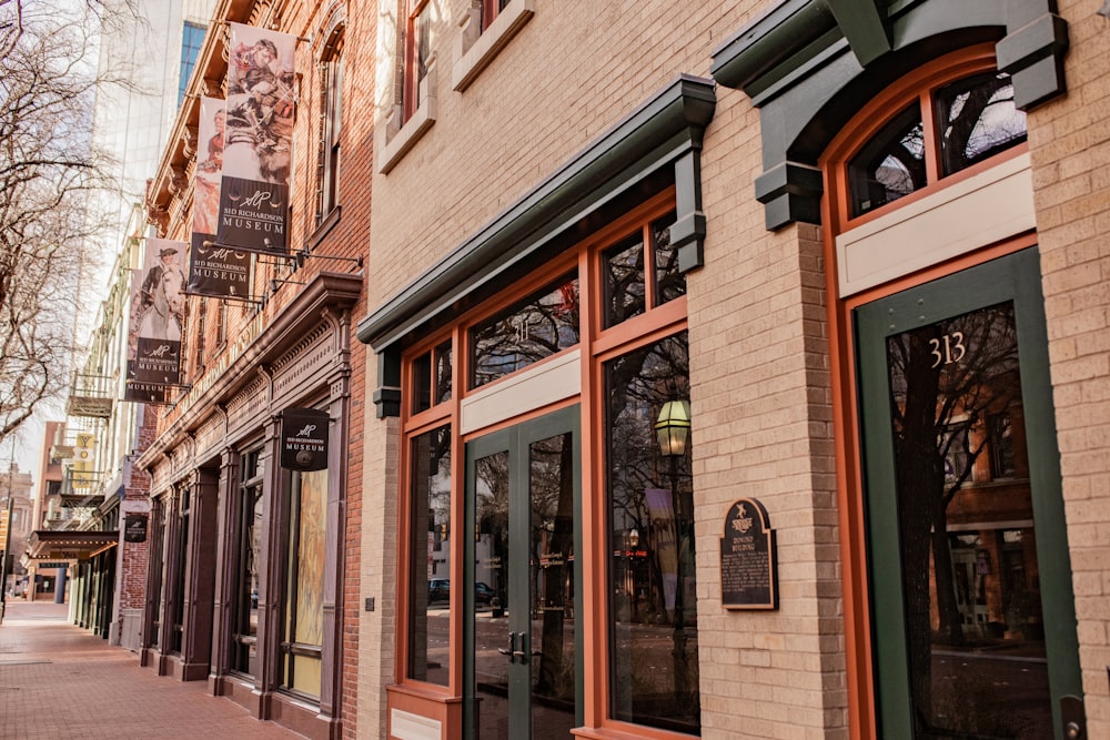 a brick building on a city street