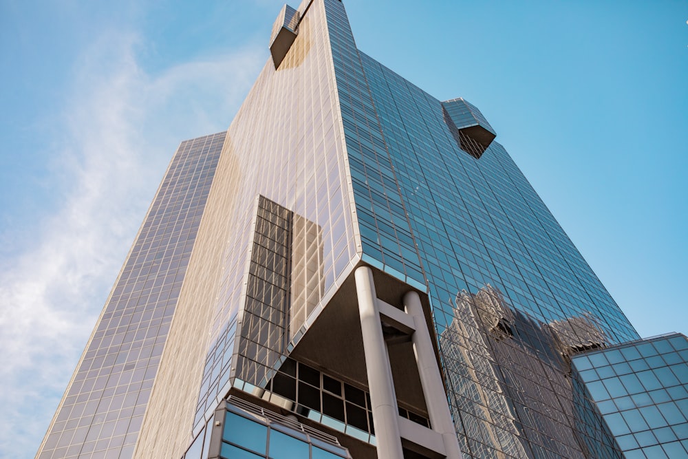 a tall building with a clock on the top of it