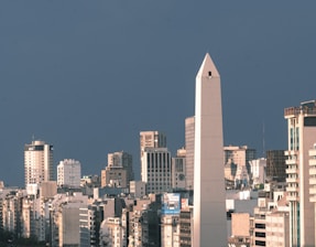 a very tall building in the middle of a city
