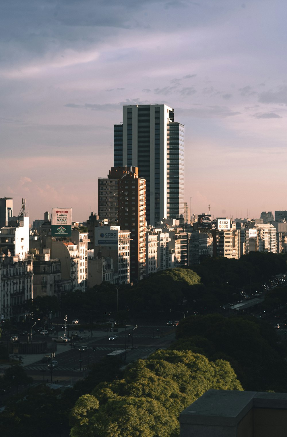 a view of a city with tall buildings