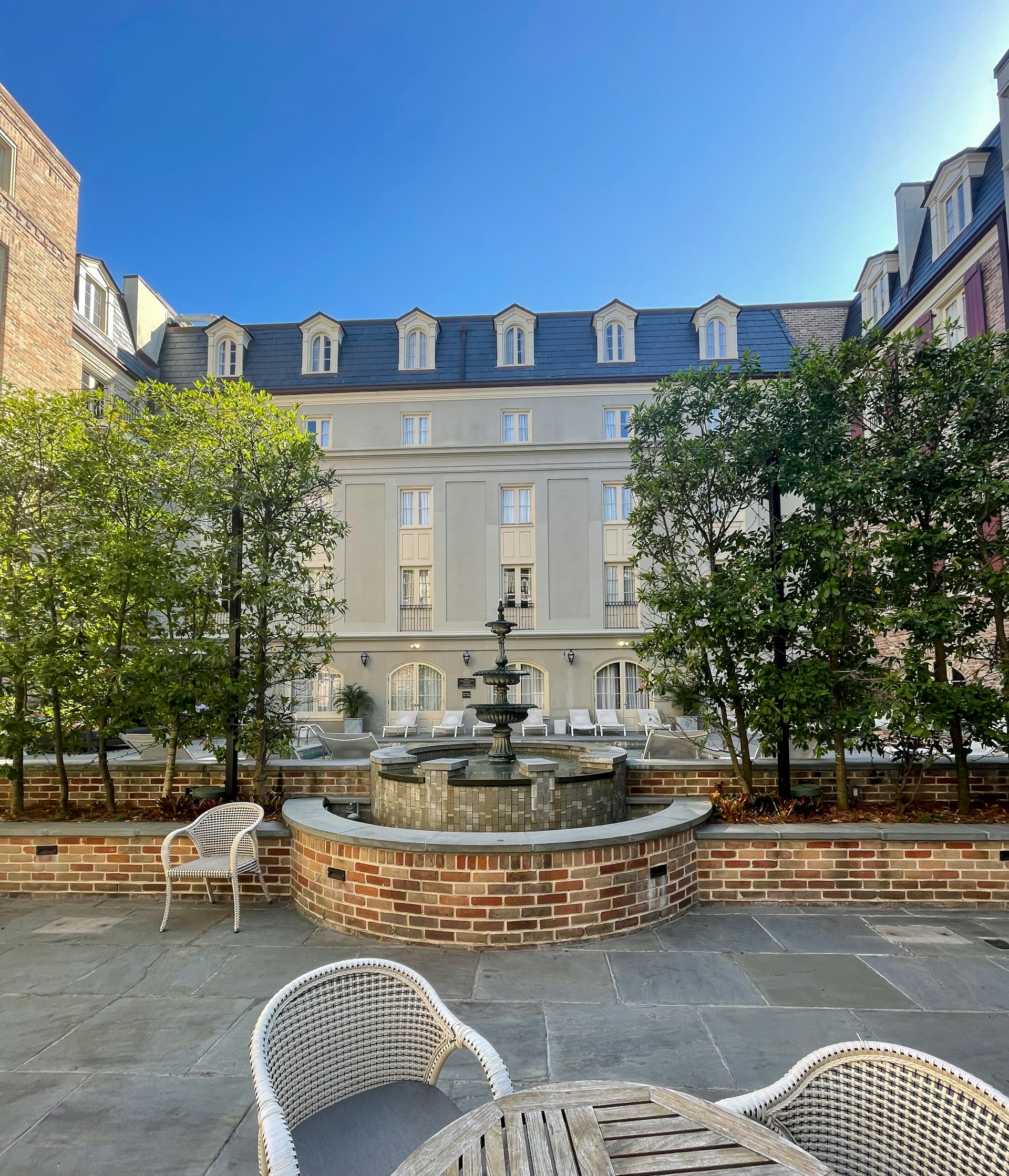 woman wearing yellow long-sleeved dress under white clouds and blue sky during daytime