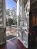 Elegant aluminum folding door opening to a bright patio.