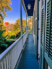 Close-up of waterproof flooring being applied on a balcony surface.