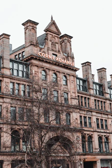 a large building with a clock on the top of it