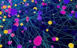 a large group of colorful balls floating in the air
